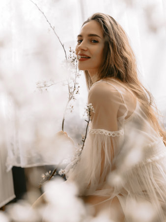 Portrait of beautiful fashionable woman with natural flawless skin, wearing trendy vintage style pastel dress. Spring, summer fashion, beauty conceptの写真素材