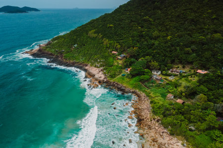 Scenic coastline with mountains and blue ocean with waves in Brasil. Aerial viewの写真素材