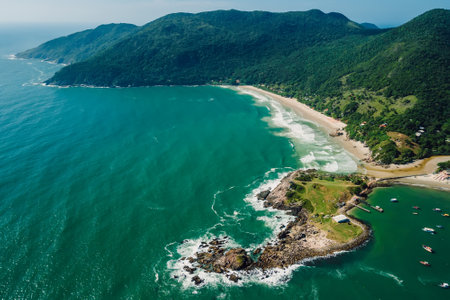 Coastline with mountains, rocky island and beach in Brazil. Aerial view of Ponta das Campanhas in Florianopolisの写真素材