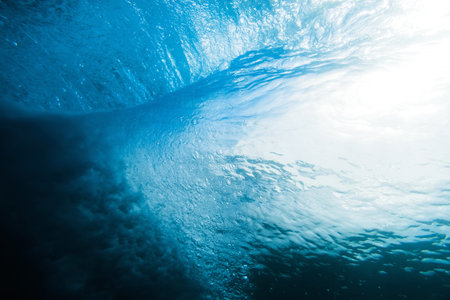 Underwater barrel wave. Perfect barrel wave breaking in ocean.の写真素材