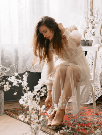Portrait of woman wearing vintage pastel dress. Spring or summer fashion conceptの写真素材