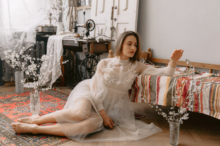 Attractive fashionable woman wearing vintage style pastel dress. Spring fashion conceptの写真素材
