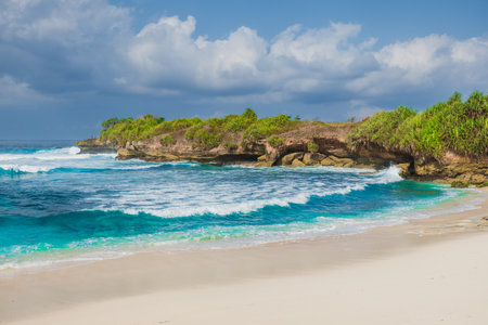 Tropical paradise beach with blue ocean in Lembongan island, Indonesiaの写真素材