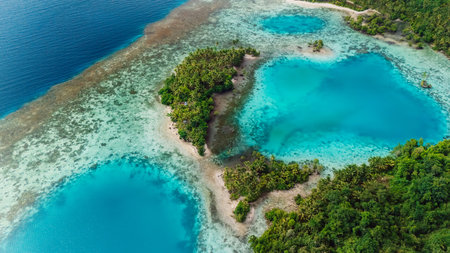 Tropical scenic landscape with blue ocean lagoon in East Indonesia. Aerial viewの写真素材