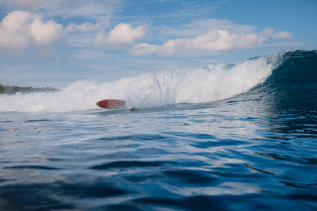 Surfer fell off a ocean wave. Wipe out during surfingの写真素材