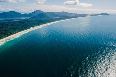 Beach and ocean in Brazil. Aerial view of Barra da lagoa village in Florianopolis