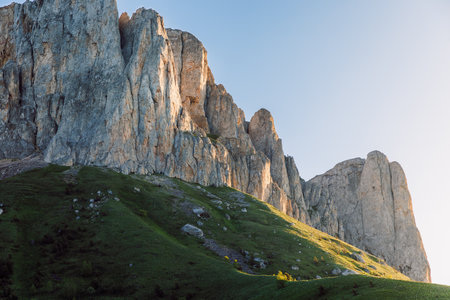 Bolshoy Tkhach rocky mount in Caucasus with warm sunrise lightの写真素材