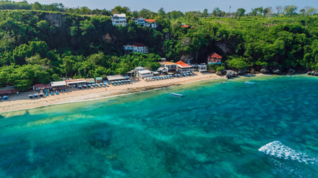 Tropical coastal landscape with sandy beach and turquoise ocean in Bali. Aerial viewの写真素材