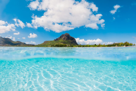 Tropical turquoise sea and Le Morne mountain in Mauritius.の写真素材