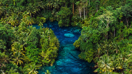 Most transparent lake with crystal blue fresh water in Indonesia. Drone above viewの写真素材