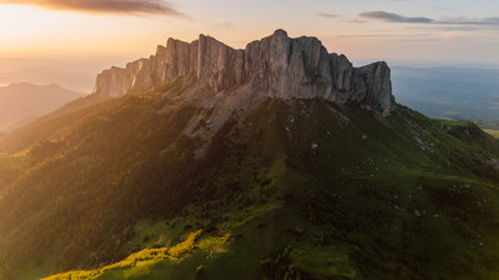 Aerial shot of national park Bolshoy Tkhach mountain in Caucasus with sunset tonesの写真素材