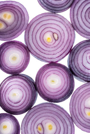Backlight through a slices of spanish red onion.の写真素材