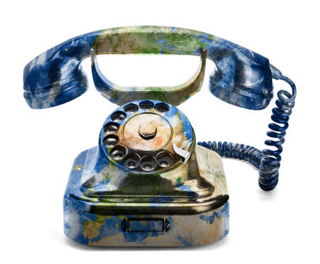 A retro phone with rendered earth texture. The concept of connecting the globe.の写真素材