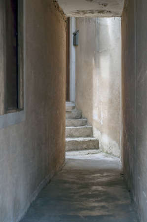 An old ruined grunge corridor.の写真素材