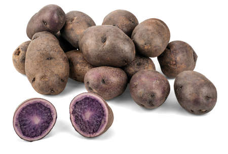 The Purple potato (botanical name Solanum andigenum), also known as Blue Potatoes or Vitelotte, is native to the Lake Titicaca within the high plains and mountain slopes of Peru and Bolivia.の写真素材