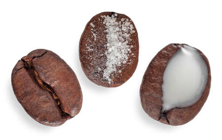 Macro shot of three coffee beans with sugar and milk. Top view on white background. 3 in 1 concept.の写真素材
