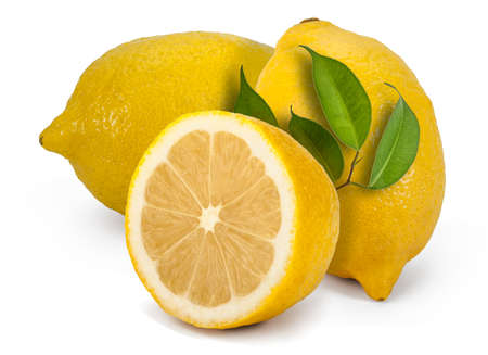 Two and a half fresh lemons with leaves on a white background.の写真素材