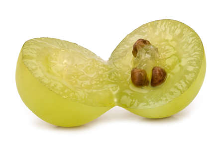 A cut berry of green grapes. Macro shot of juicy grape isolated on white background.の写真素材