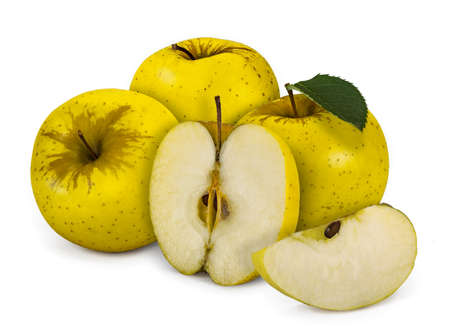 A group of ripe apples (Scientific name: Malus domestica 'Golden Delicious') with leaf, isolated on white.の写真素材