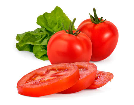 A lettuce leaf, two whole tomatoes (Solanum Lycopersicum) and macro of few slices in front of them, isolated on white.の写真素材