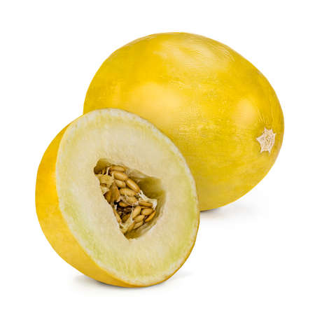 One and a half yellow melon, isolated on a white background. The Canary melon (Cucumis melo) or winter melon is a large, bright-yellow elongated melon with a pale green to white inner flesh.の写真素材