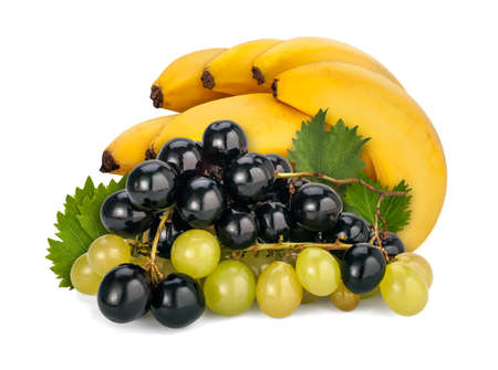 Black and white Muscat grapes with leaves, in front of a bunch of banana on white background.の写真素材