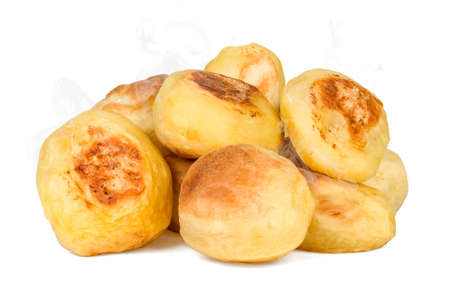 Hot roasted potatoes isolated on white, steam rises.の写真素材