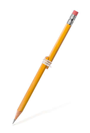 Stupid repair of a broken pencil as concept absurd decisions.の写真素材