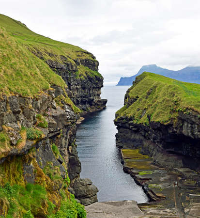 Port in a rock canyon in Gjogv (Faroe)の写真素材