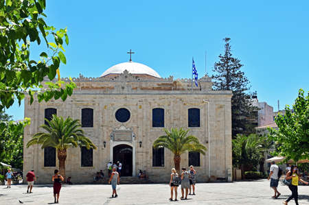 Heraklion, Greece - July 15, 2016: People waiting and walking in front of the Church of Saint Titus in Heraklion, the capital of the Mediterranean Iceland of Crete in Greece.のeditorial素材