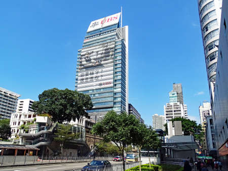 Tsim Sha Tsui, Hong Kong - February 09, 2016: One Beijing skyscraper with the lying in front former...