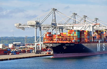 Aarhus, Denmark? July 20, 2017: The container ship MSC INGY has docked at the port of Aarhus (Denmark) and is loading and unloading. With a loading capacity of over 19,000 containers, it is one of the largest container ships in the world. The port of Aarhのeditorial素材