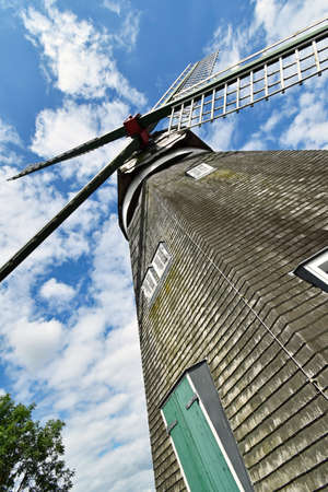 View of a windmill from the bottom up to the wingsの写真素材
