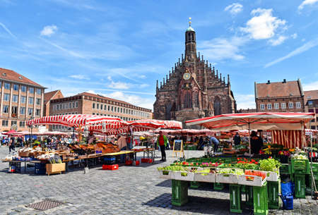 Nuremberg, Germany - June 23, 2018: Market stalls on the market square of the Franconian city of Nuremberg in Germany.のeditorial素材