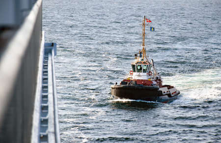 Aarhus, Denmark - July 20, 2017: The tug AROS navigates the port.のeditorial素材