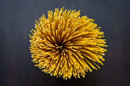 Bunch of spaghetti on a wooden table. Selective focus.の写真素材