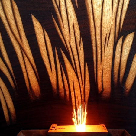 A candle burns in a candlestick. Close-up.の写真素材