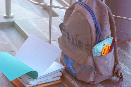 school backpack, notebooks, books close-up. supplies and objects for study. Concept school days, pupil, learner, scholar. student accessoriesの写真素材