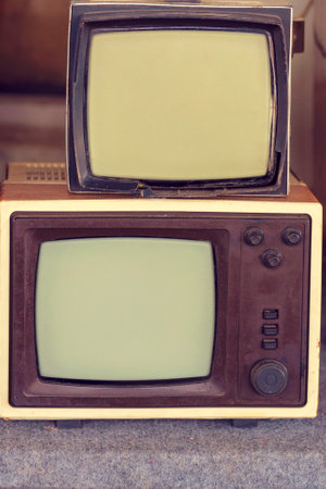 Many retro television. vintage old TV is colorful multi-row. Seeing the past. Pattern wall of old Antique television (TV)の写真素材
