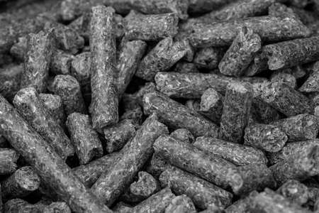 Pellet Production, wood-pellet. alternative fuel sources. Concept Biofuel. sunflower pellets....