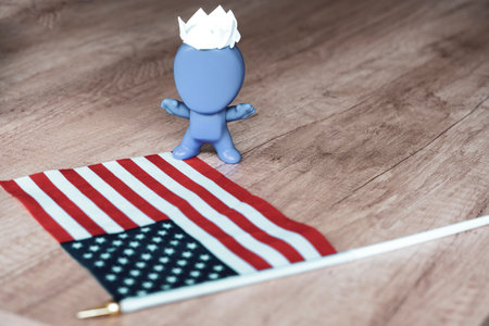 person figurine with USA flag. man with USA flag. USA Coronavirus Pandemic Concept. The concept of quarantine, flu, coronavirus.の写真素材