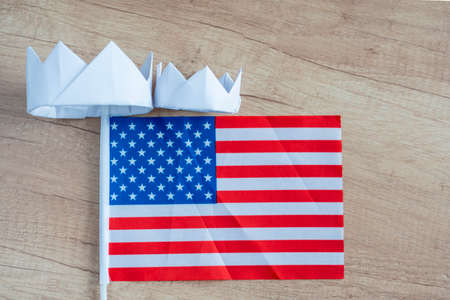 corona, crowns on the background USA flag. Concept voters, US Elections,elections in america , presidential candidates, senate candidatesの写真素材