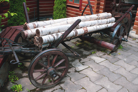 Antiquarian transport. Old wooden two-wheeled cartの写真素材