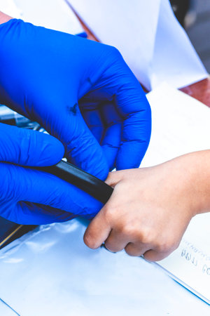 police expert takes fingerprints. Male fingerprint is taken. Concept biometric data of the person....