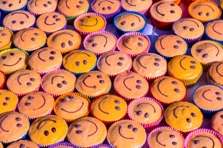 smiley faces. smile cakes on table. The concept teamwork, friends, society, community, togethernessの写真素材
