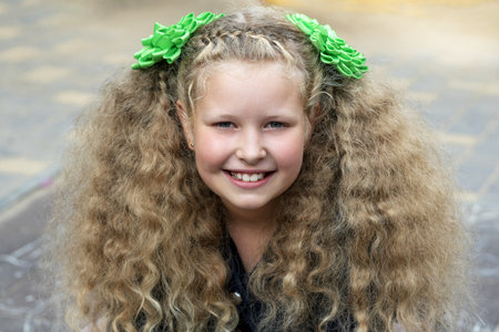 Cheerful girl. A happy child. portrait of a joy teenagerの写真素材