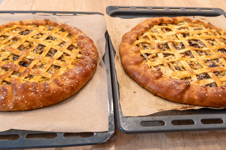 Pies on a baking sheet. homemade pie, home baking conceptの写真素材