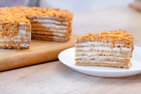 Honey cake. classic honey cake. Slit and Slice of Cake. Homemade baking concept