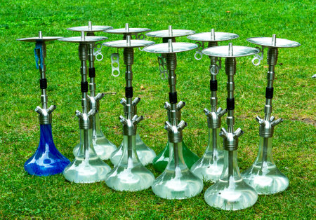 lot of hookahs. Oriental hookah.Smoking eastern shisha.The concept outcast among others
