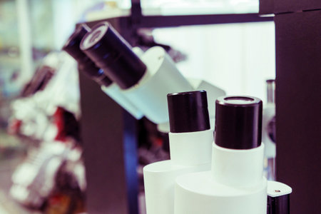 microscopes on a table of laboratory. Medical equipment. Laboratory lens of Microscope. science equipment and medical instruments. medicine research in laboratory with microscopeの写真素材